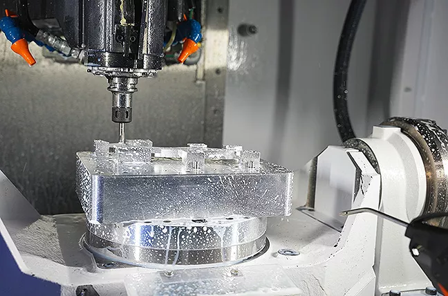 Integrated Brother 5-axis rotary table with compact machine size, helping M/s Future Tech Engineering  achieve efficient multi-face machining in limited shop-floor space.